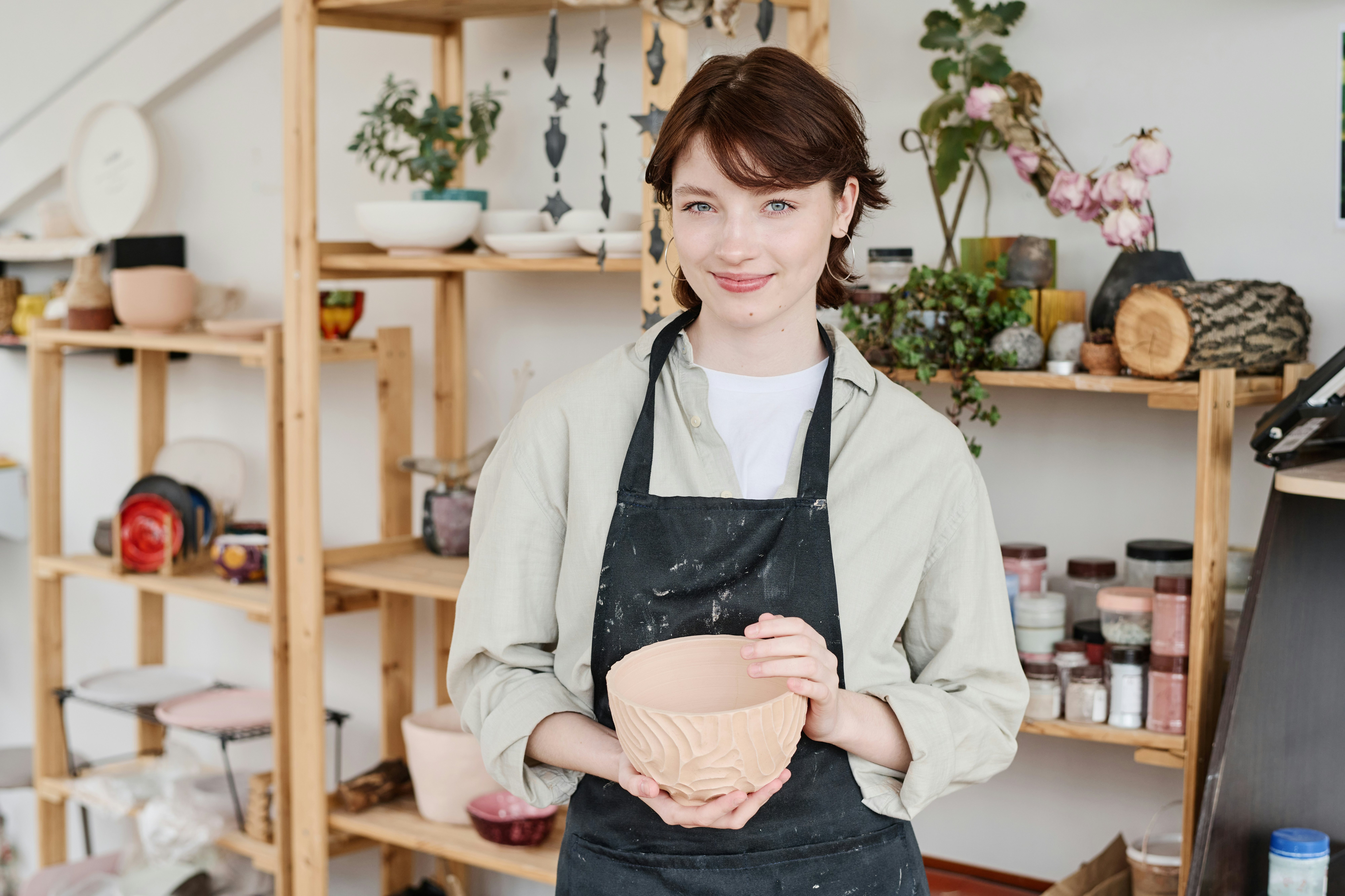 Small business owner in pottery studio